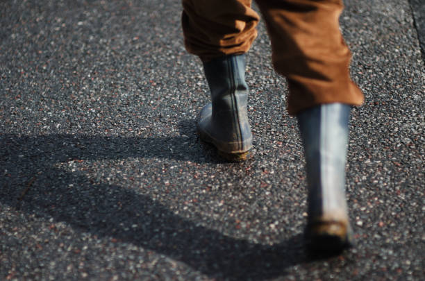 istock Rubber Boots Walking Outdoors 859638728