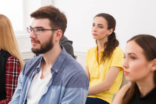 istock Group of people sitting at seminar, copy space 859638750