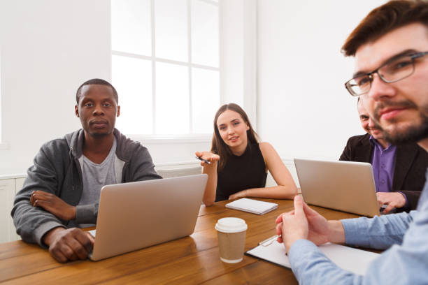 istock Business meeting. Young team in modern office 859639338