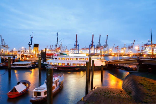 Hamburg harbor with historic ships at Övelgönne Hamburg, Germany - October 02, 2017. Hamburg harbor at Övelgönne. Historic icebreaker Stettin and restaurant boat Bergedorf in front of the container harbor skyline. övelgönne stock pictures, royalty-free photos & images