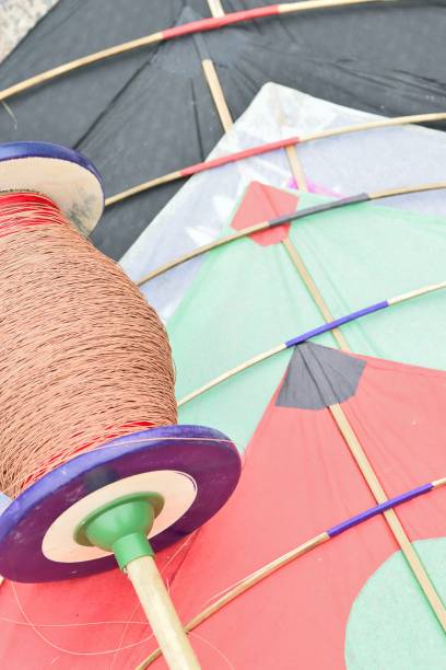 istock Background of colorful Indian Kite with threads called Manjha 859647316