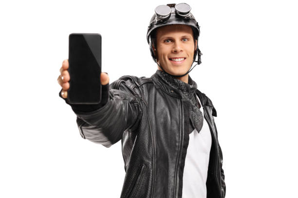 istock Biker showing a phone and smiling 859654198