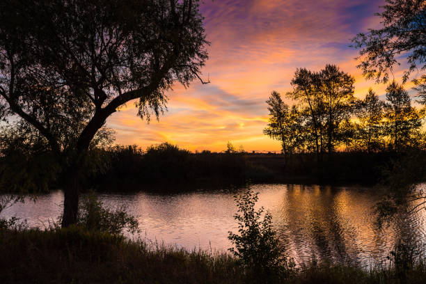 istock landscape of sunset with cloudy orange sky 859662878