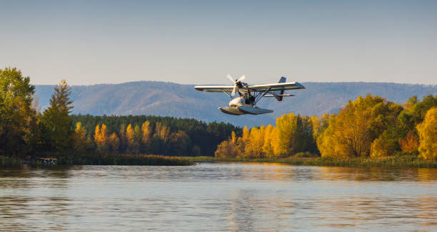 istock Seaplane flying over the bay 859662992