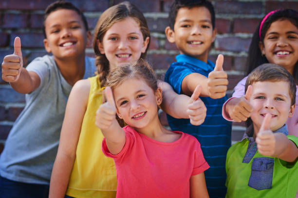 istock Thumbs up to another great year at school 859664856