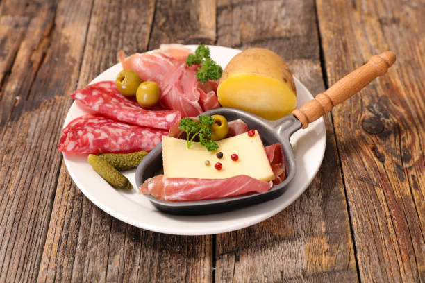 raclette cheese with salami and potato