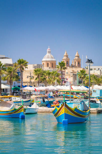 istock Marsaxlokk harbour and church 859671558