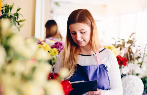 istock Florist woman taking order. 859671972