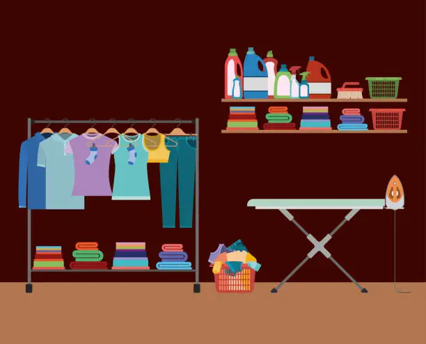 Vector illustration of brick wall background of clothes in hangers with table and clothes iron and elements of home laundry