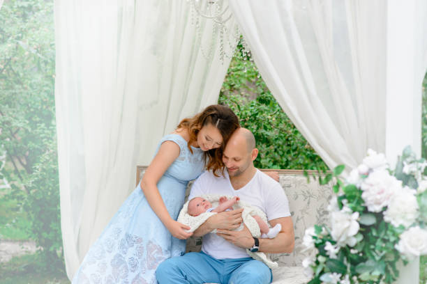 istock Happy family with the baby 859680320