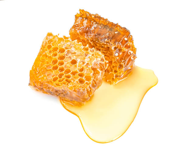Sweet honeycomb top view, isolated on white Sweet honeycomb top view, isolated on white hexagon photos stock pictures, royalty-free photos & images