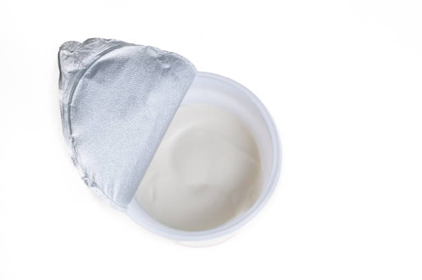 Plastic container set of yogurt or dessert or white sour cream isolated on white background
