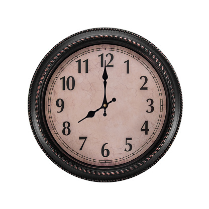 Ancient wall clock on a white background. The clock is eight in the morning or evening.