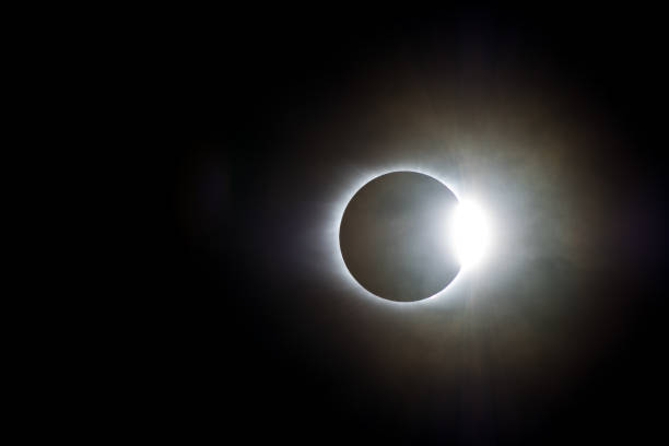 istock The Sun Emerges From Behind the Moon on a Cloudy Day 859710920