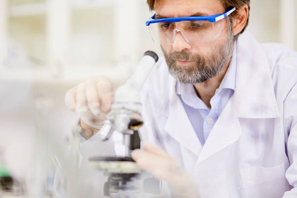 istock Portrait of Bearded Researcher at Workplace 859711408