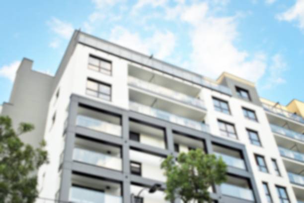 istock Abstract blur of modern apartment building. 859711604