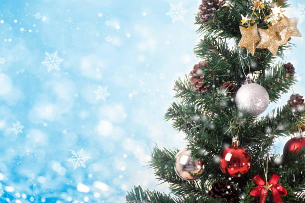 istock Christmas tree with decorations and snowflake on blue bokeh background. for Happy New Year 2018 859723616