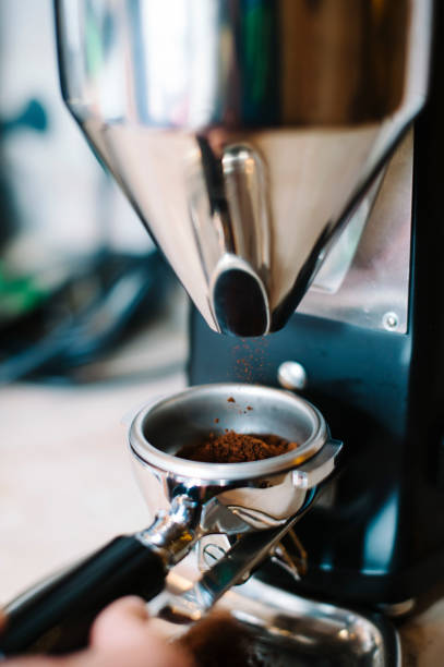 istock coffee grinder grinds freshly roasted coffee beans 859727276