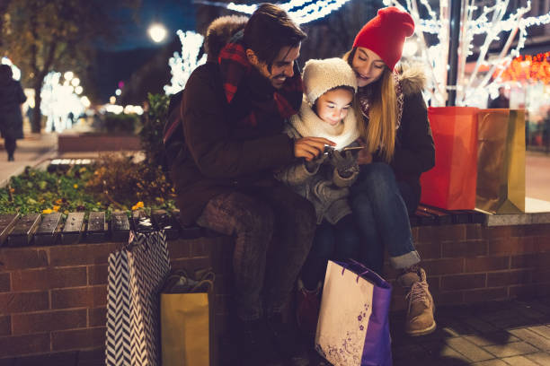 istock Young family outside at Christmas 859727424