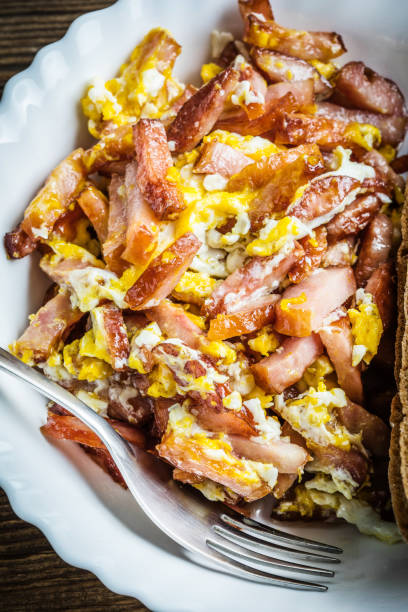 istock Pieces of sausage fried with egg. 859727490