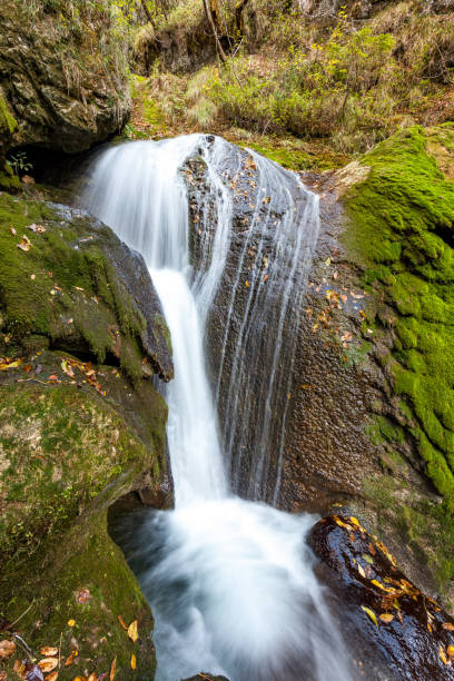 istock waterfall of a mountain stream 859727880