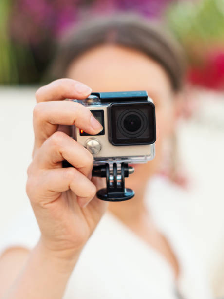 istock Woman shooting with action camera. 859735382