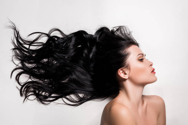 istock woman with beautiful black hair 859740620