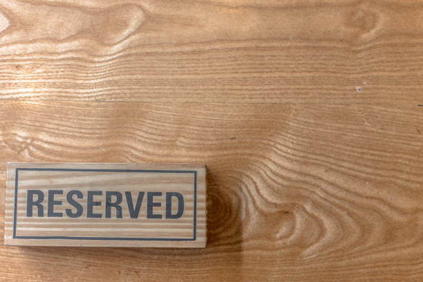 istock Coffee shop reserved sign on the table. 859748888