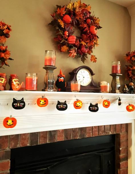 istock Autumn household decor on fireplace mantle 859748992