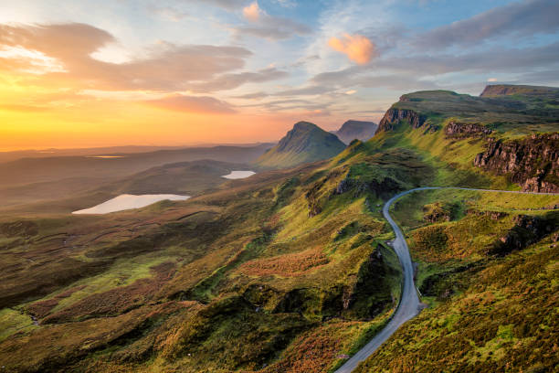 Quiraing at sunrise. Vibrant sunrise at Quiraing on the Isle of Skye, Scotland. scottish highlands photos stock pictures, royalty-free photos & images