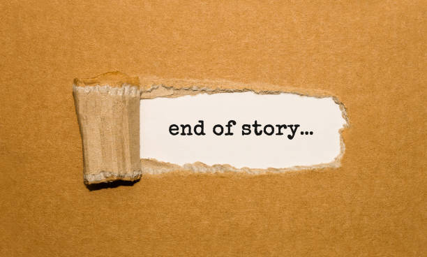 istock The text end of story appearing behind torn brown paper 859756874