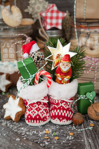 Small boots with gifts and sweets for St. Nicholas / Christmas