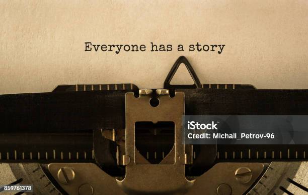 Text Everyone Has A Story Typed On Retro Typewriter Stock Photo - Download Image Now