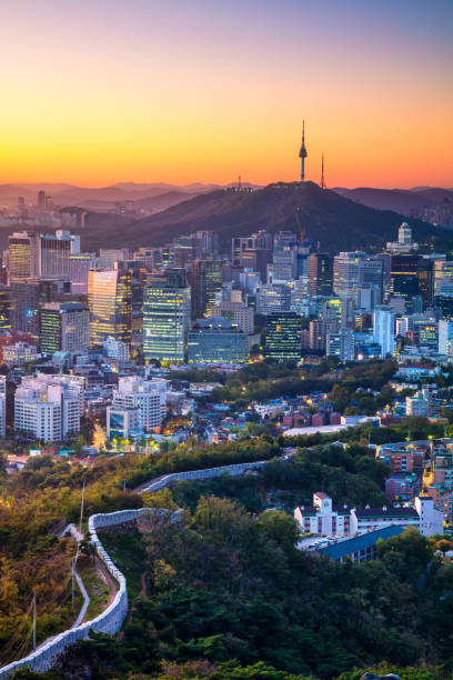 Seoul Cityscape image of Seoul downtown during summer sunrise. seoul stock pictures, royalty-free photos & images