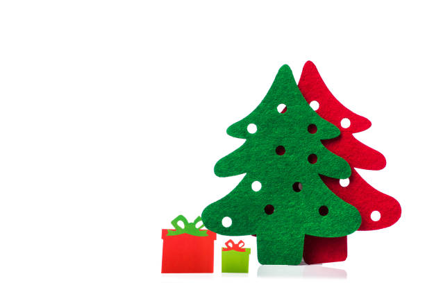 istock christmas trees with gifts 859783578