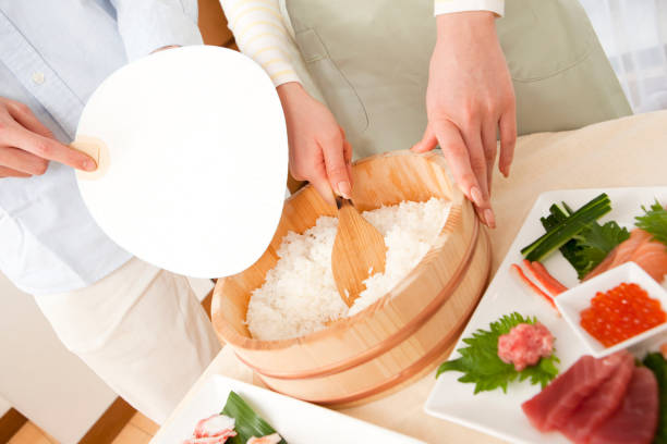 istock Vinegar couple making dinner in hand 859784440
