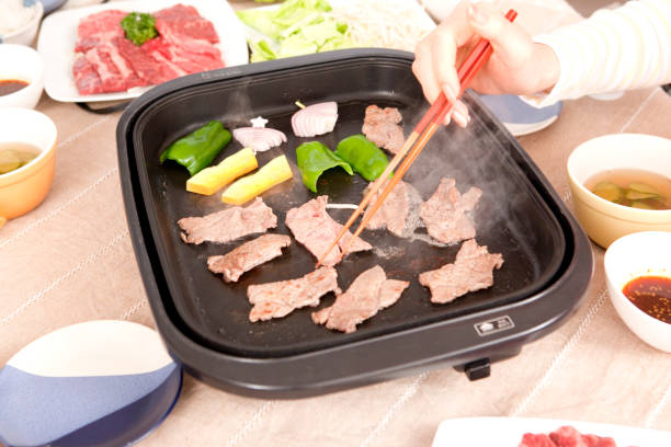 istock Bake the meat in the hot-plate image 859786946