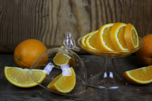 istock orange fruit wooden background 859791666