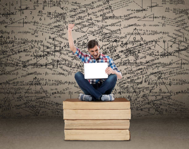 istock Young man celebrating online success 859803904