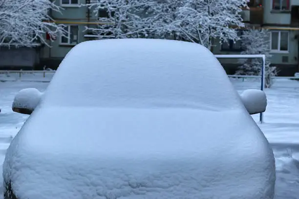 Photo of car covered snow