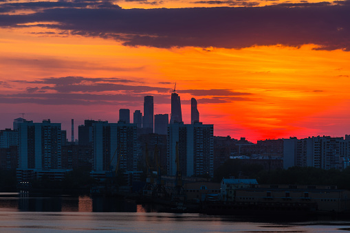 Sunrise at the Moscow city. Silhouette of buildings.