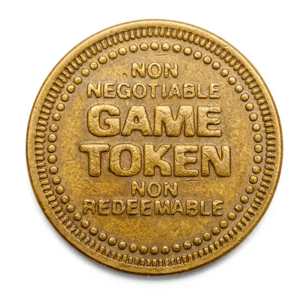 Arcade Video Game Token Isolated on White Background.