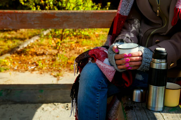 istock Girl with a cup of hot herbal tea 859829116