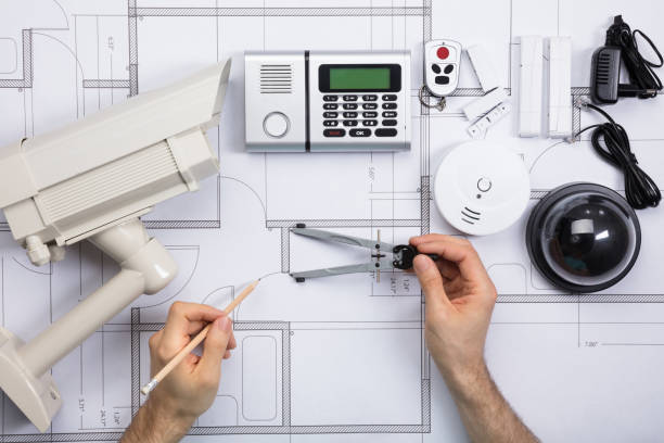 istock Male Engineer Working On Blueprint With Security Equipments 859829634