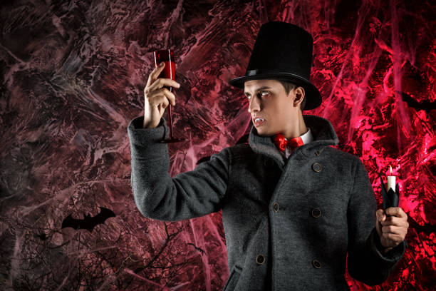 istock handsome man dressed in a Dracula costume for Halloween. 859830838