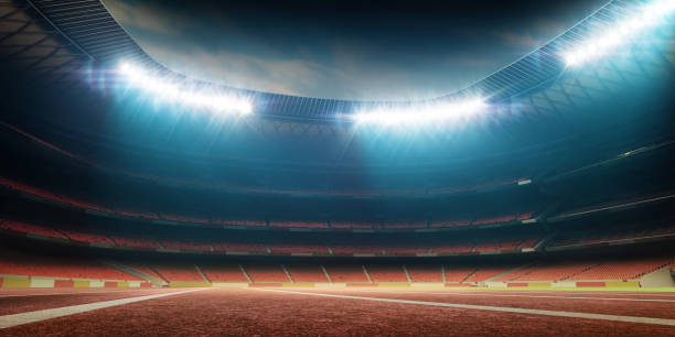 istock soccer stadium with running track 859833092