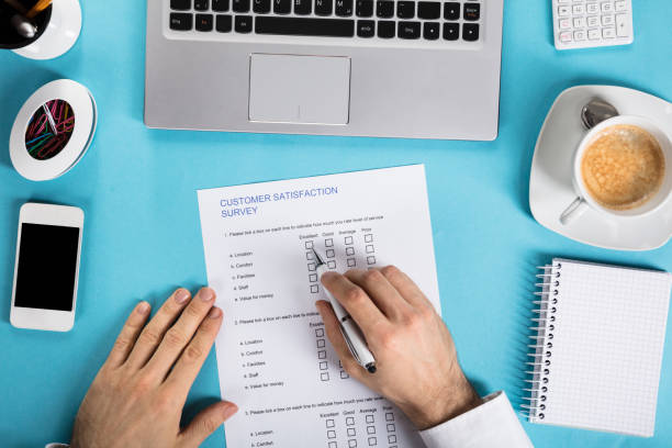 istock Businessman Filling The Customer Satisfaction Survey Form 859833380