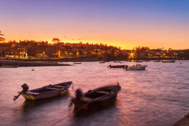 istock Boats on Naval harbor at twilight 859834716