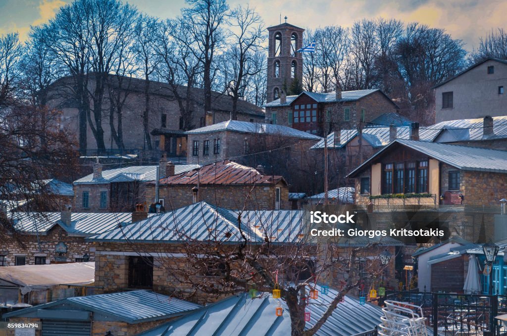 Nymfaio the picturesque traditional village of north Greece Nymfaio is a picturesque traditional village of Greece and a very popular winter destination. Arcturos organisation which protects brown bears was founded there and provides shelter for wounded bears. Nymfaio Stock Photo