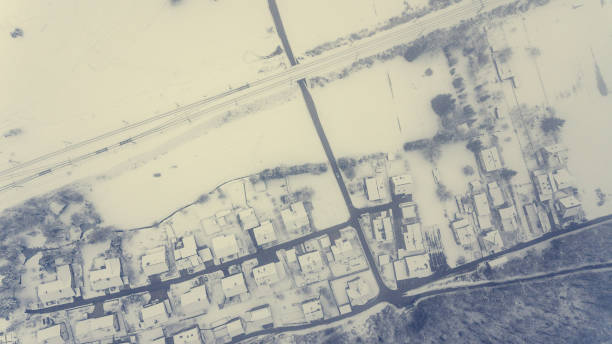 Top view of snow covered buildings. Borovnica, Slovenia